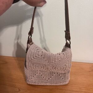 Boho crocheted tan purse.